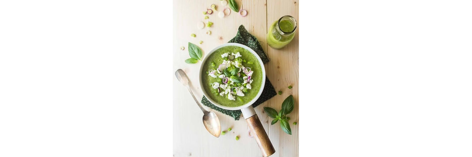 Fresh zucchini soup with goat cheese