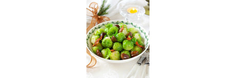 Pan-fried chestnuts and Brussels sprouts with bacon bits for Christmas
