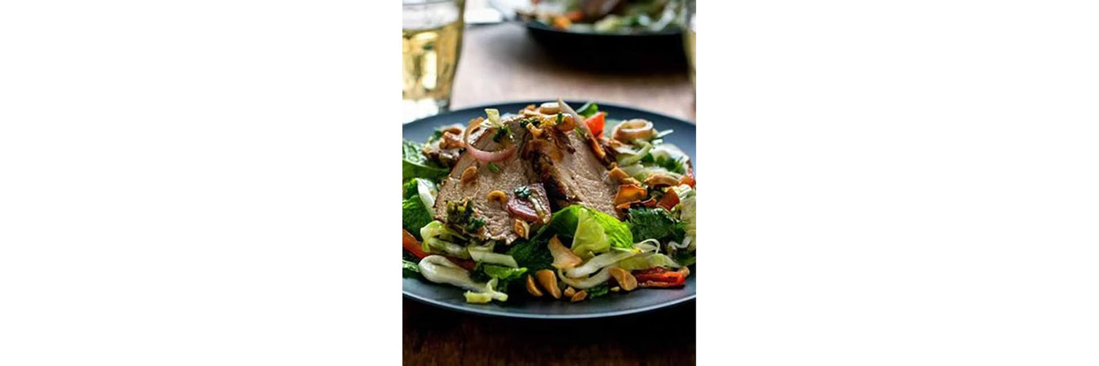 Warm pork mandarin salad