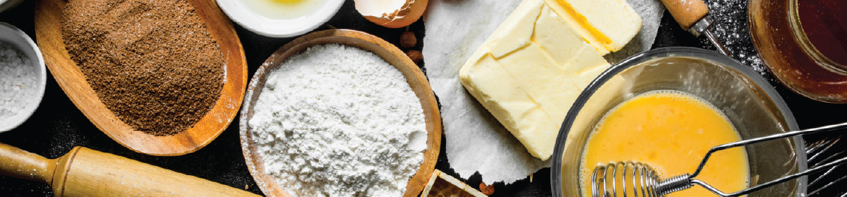 Baking ingredients collection featuring flour, chocolate, fondant, baking mixes, flavorings, yeast, toppings, and pastry essentials from Le Petit Depot.