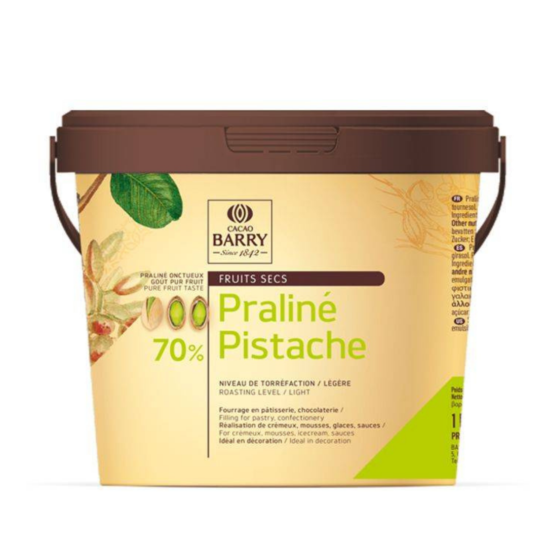 PISTACHIO PASTE PRALINE 70% 1KG/CACAO BARRY (#128748) in a packaging with pistachio design.